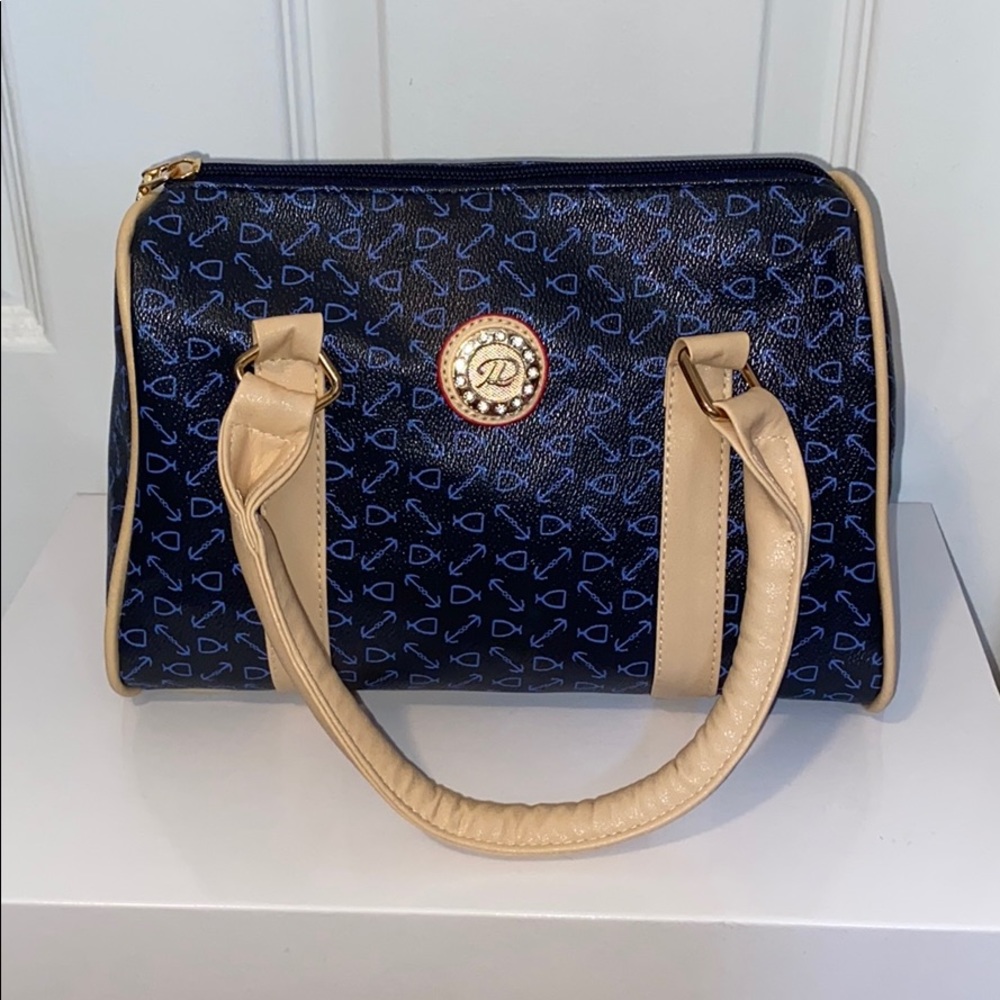 Navy blue w/ beige handles purse